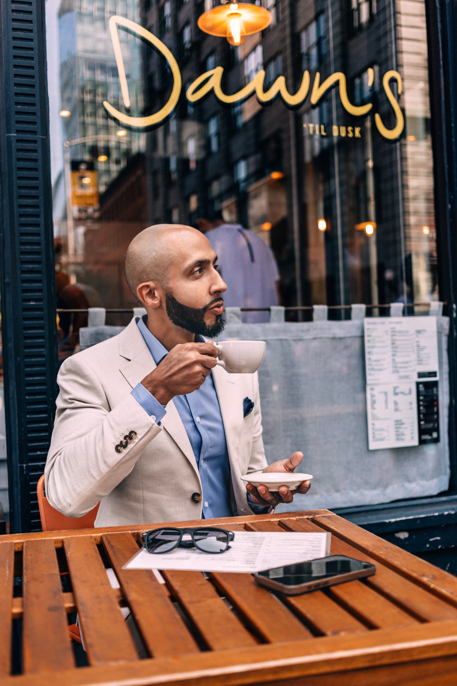 Vinnie Rodriguez having an espresso at a New York café